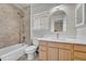 Bright bathroom features a tub and shower, and vanity with white marble countertop at 2188 Savage Rd, Elizabeth, CO 80107