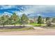 Circular driveway and lush landscaping welcome you to this picturesque home and large property at 2188 Savage Rd, Elizabeth, CO 80107