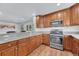 Well-appointed kitchen with granite countertops, stainless steel appliances, and ample cabinet space at 2188 Savage Rd, Elizabeth, CO 80107