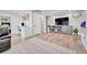 Inviting living room with stylish decor, a modern entertainment center, and a cozy workspace at 2188 Savage Rd, Elizabeth, CO 80107