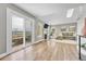 Bright living room with a fireplace, comfortable seating, and sliding doors to the deck at 2188 Savage Rd, Elizabeth, CO 80107