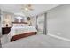 Spacious main bedroom featuring vaulted ceilings, plush carpeting, and a serene atmosphere with ample natural light at 2188 Savage Rd, Elizabeth, CO 80107