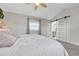Bright main bedroom with plush carpet flooring, sliding door to bathroom, and neutral paint at 2188 Savage Rd, Elizabeth, CO 80107