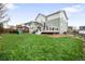 Backyard with a grassy lawn and playset, perfect for outdoor fun and relaxation at 10906 Pastel Pt, Parker, CO 80134