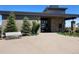 Attractive clubhouse with stone accents, lush landscaping, and a welcoming entrance at 10906 Pastel Pt, Parker, CO 80134