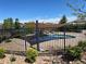 Private hot tub area enclosed by a decorative fence, perfect for relaxing after a long day at 10906 Pastel Pt, Parker, CO 80134