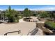 Scenic park featuring walking paths, mature trees, stone landscaping, and community gathering areas at 10906 Pastel Pt, Parker, CO 80134