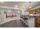 Finished basement with a bar area and a pool table, ideal for entertaining at 21753 E Heritage Pkwy, Aurora, CO 80016