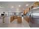 Spacious open kitchen featuring stainless steel appliances and granite countertops at 21753 E Heritage Pkwy, Aurora, CO 80016