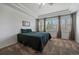 Calm main bedroom with big window for natural light and tray ceilings at 21753 E Heritage Pkwy, Aurora, CO 80016