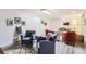 Cozy basement living room with comfortable seating, accent chairs, area rug, and accent lighting at 2310 Squires Ct, Longmont, CO 80501