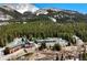 Breathtaking aerial view of resort in lush forest, offering a serene and secluded experience at 4192 Highway 9 # 3, Breckenridge, CO 80424