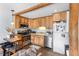 Functional kitchen featuring wood cabinets, efficient appliances, and open layout at 4192 Highway 9 # 3, Breckenridge, CO 80424