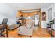 Open living space with hardwood floors and wood accents with access to the kitchen area at 4192 Highway 9 # 3, Breckenridge, CO 80424