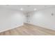 Finished basement featuring white walls, recessed lighting, and light-colored floors at 4034 S Atchison Way, Aurora, CO 80014