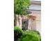 Close-up of the home's address above a brick front entrance with a security gate at 4034 S Atchison Way, Aurora, CO 80014