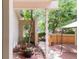 Outdoor patio area featuring a charming brick surface, wooden fence and garden area at 4034 S Atchison Way, Aurora, CO 80014
