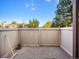 Private patio with gravel ground cover and wooden fence at 7870 W 87Th Dr # L, Arvada, CO 80005