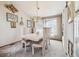 Dining room with a modern chandelier, and an abundance of natural light at 3333 E Florida Ave # 108, Denver, CO 80210