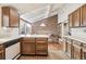 Another view of the kitchen featuring the breakfast nook and lots of storage at 3333 E Florida Ave # 108, Denver, CO 80210