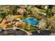 Overhead shot of the neighborhood pool featuring a diving board, recreational pool, and toddler wading pool at 19770 E Geddes Pl, Centennial, CO 80016
