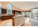 Open-concept kitchen with a large arched window offering plenty of natural light at 19770 E Geddes Pl, Centennial, CO 80016