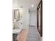 Bathroom featuring a sleek vanity, modern fixtures, and a large mirror for a stylish touch at 2965 S Gilpin St, Denver, CO 80210