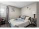 Cozy bedroom with a comfortable bed, neutral decor, and a relaxing ambiance at 6521 E 70Th Pl, Commerce City, CO 80022