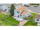 Aerial view of a charming home showcasing its well-manicured lawn, private backyard, and lovely outdoor living spaces at 9651 Bighorn Way, Littleton, CO 80125