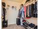 Organized walk-in closet with shelving and ample storage space for clothes, shoes, and accessories at 9651 Bighorn Way, Littleton, CO 80125