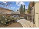 Cozy back deck with wood fence and seating area, perfect for outdoor relaxation at 7444 E 9Th Ave, Denver, CO 80230