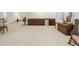 Large finished basement area, suitable for fitness and recreation equipment at 7444 E 9Th Ave, Denver, CO 80230