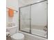 Bright bathroom with a shower and tub combination at 7444 E 9Th Ave, Denver, CO 80230