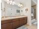 Bathroom featuring double sinks with vanity at 7444 E 9Th Ave, Denver, CO 80230