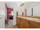 Bathroom featuring double sinks with tile counters at 7444 E 9Th Ave, Denver, CO 80230