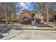 Charming two-story home with desert landscaping and an arched entryway at 7444 E 9Th Ave, Denver, CO 80230