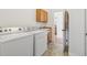 A laundry room featuring a washer and dryer at 7444 E 9Th Ave, Denver, CO 80230