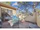 Charming patio with stone pavers and comfortable seating, ideal for entertaining at 7444 E 9Th Ave, Denver, CO 80230