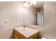 Clean bathroom with single sink vanity, tile flooring and shower/tub combo at 229 Bross St # D, Longmont, CO 80501