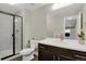 Modern bathroom featuring a glass-enclosed shower, contemporary fixtures, and a clean design for a spa-like experience at 1180 Ascent Trail Cir, Erie, CO 80516