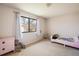 bedroom features large window with view at 1321 Madero St, Broomfield, CO 80020