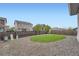 Backyard view with privacy fence and landscaping at 26902 E Ellsworth Ave, Aurora, CO 80018