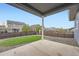 Backyard view of privacy fence, gravel and grass at 26902 E Ellsworth Ave, Aurora, CO 80018