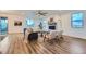Comfortable living room with fireplace, seating, and an abundance of light at 26902 E Ellsworth Ave, Aurora, CO 80018