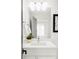 Bright bathroom vanity features a modern sink, globe lighting and contemporary fixtures at 1665 S Fillmore St, Denver, CO 80210