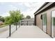 Spacious outdoor deck with glass railings offers neighborhood views at 1665 S Fillmore St, Denver, CO 80210