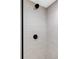 Sleek shower with horizontal tiles and black hardware, offering a modern spa-like feel at 1665 S Fillmore St, Denver, CO 80210