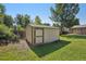 Outdoor storage shed in the well-maintained backyard offers a practical solution for decluttering and organizing at 215 Sunland St, Louisville, CO 80027
