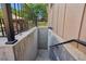 Staircase leads to the basement entrance, showing secure access from the backyard at 215 Sunland St, Louisville, CO 80027