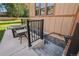 Basement entrance with secure access from the backyard and a patio table at 215 Sunland St, Louisville, CO 80027